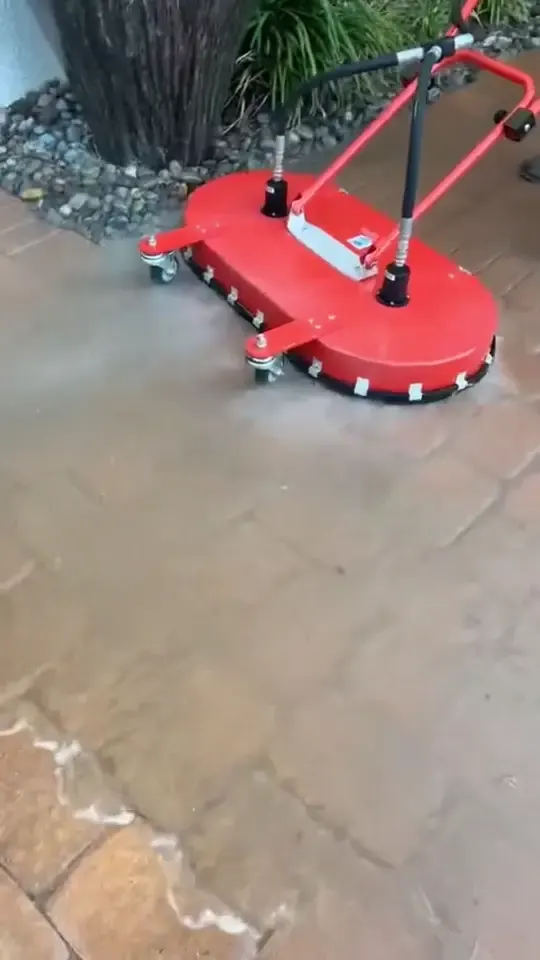 A surface cleaner, caution taped drives and stone patio work at large homes.