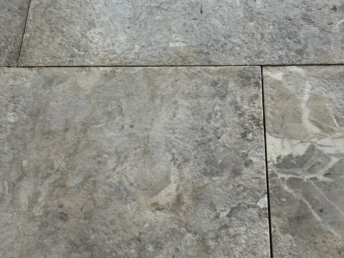 The same stone tile with the stain gone